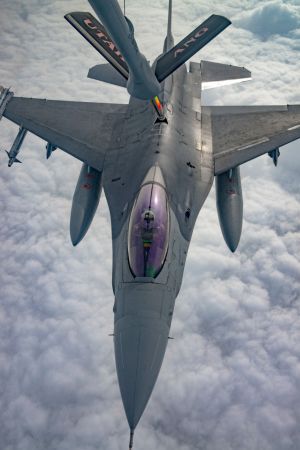 F-16 pilots, KC-135 crews team for mid-air refueling training